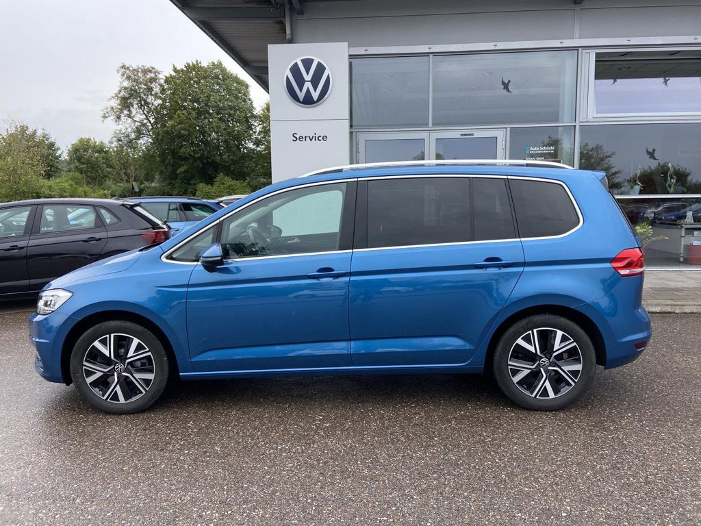 Volkswagen Touran 2022 г. Синий, пробег 49243 км