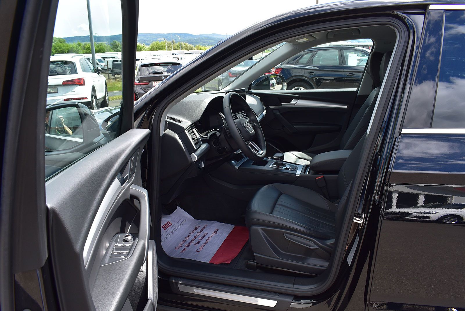 Audi Q5 2023 г. Чёрный, пробег 59986 км