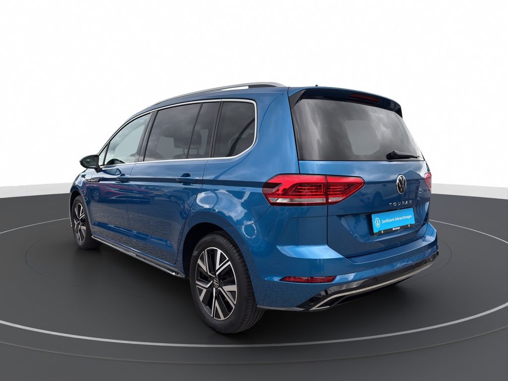 Volkswagen Touran 2023 г. Синий, пробег 57408 км