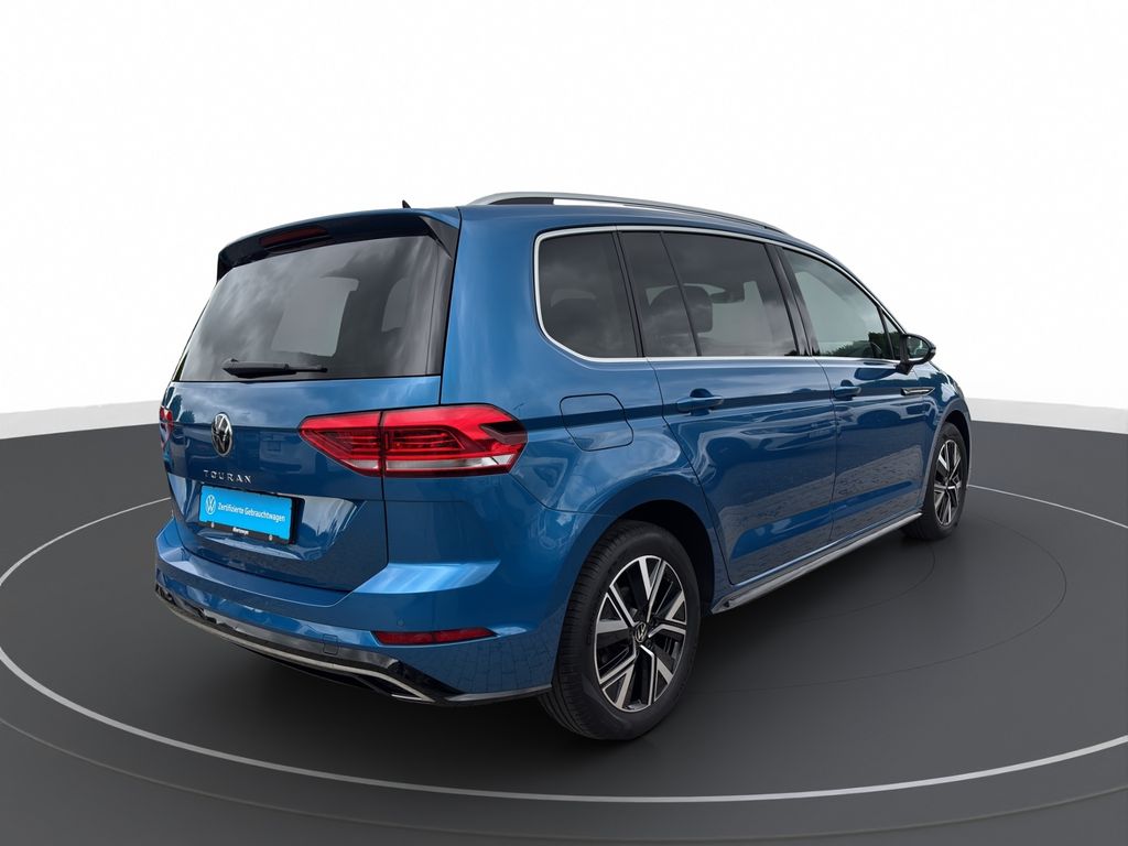 Volkswagen Touran 2023 г. Синий, пробег 57408 км