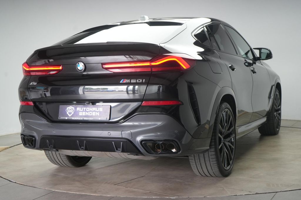 BMW X6 M60 2023 г. Чёрный, пробег 43000 км