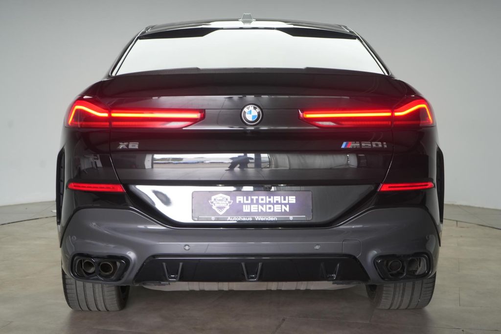 BMW X6 M60 2023 г. Чёрный, пробег 43000 км