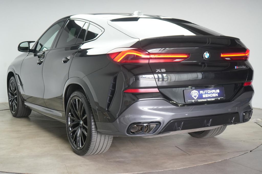 BMW X6 M60 2023 г. Чёрный, пробег 43000 км