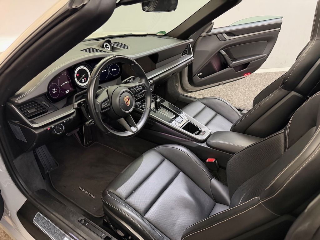 Porsche 992 2023 г. Серый, пробег 41000 км