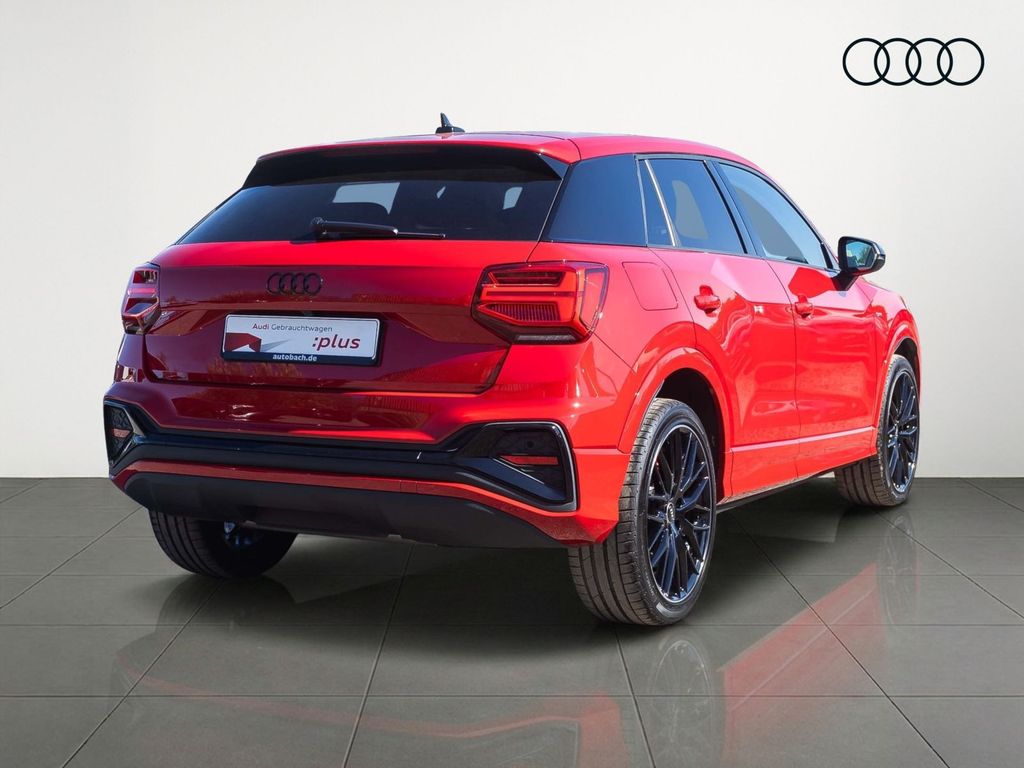 Audi Q2 2023 г. Красный, пробег 24140 км