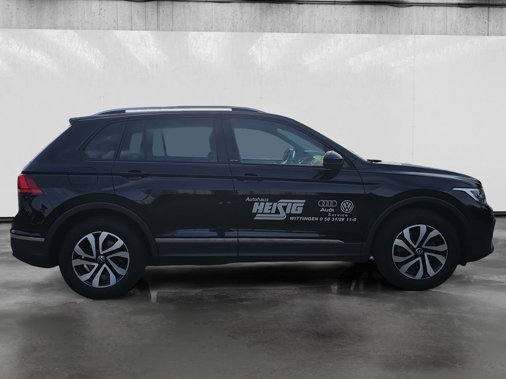 Volkswagen Tiguan 2023 г. Чёрный, пробег 39245 км