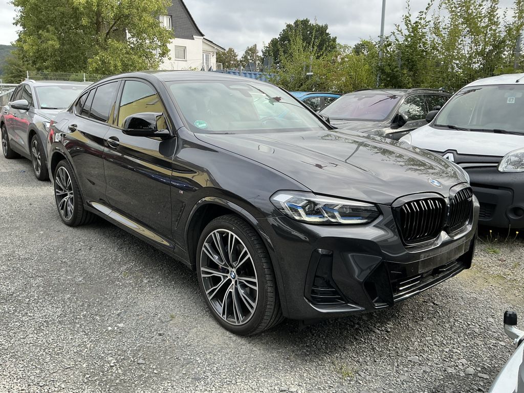 BMW X4 M40 2023 г. Чёрный, пробег 34616 км