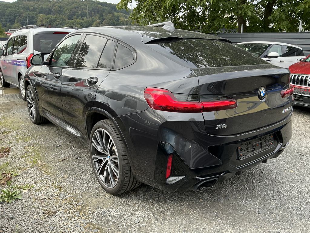 BMW X4 M40 2023 г. Чёрный, пробег 34616 км