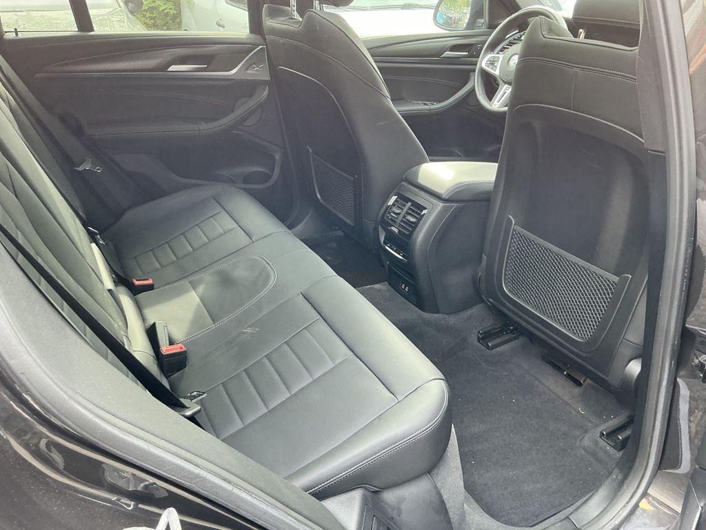 BMW X4 M40 2023 г. Чёрный, пробег 34616 км