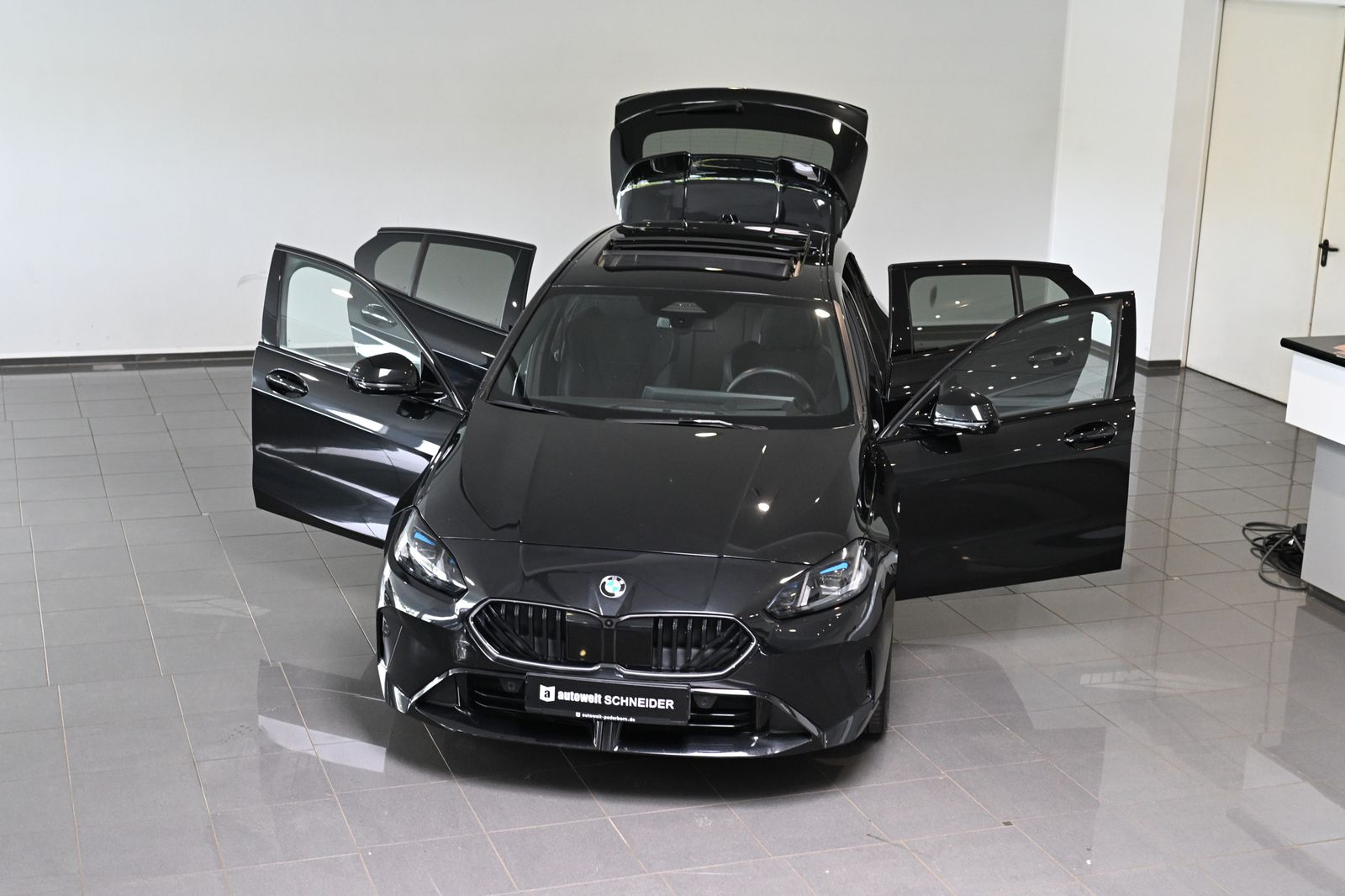 BMW 120 2025 г. Чёрный, пробег 52497 км