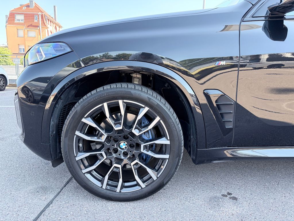 BMW X5 2023 г. Чёрный, пробег 59000 км