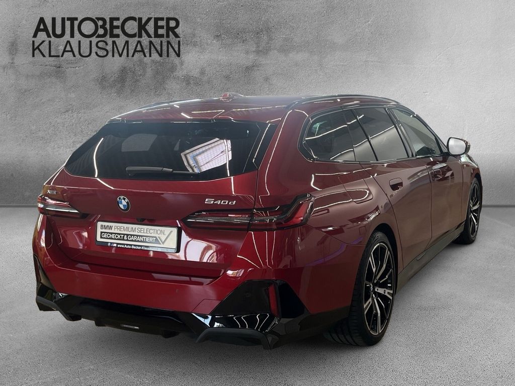 BMW 540 2025 г. Красный, пробег 34587 км