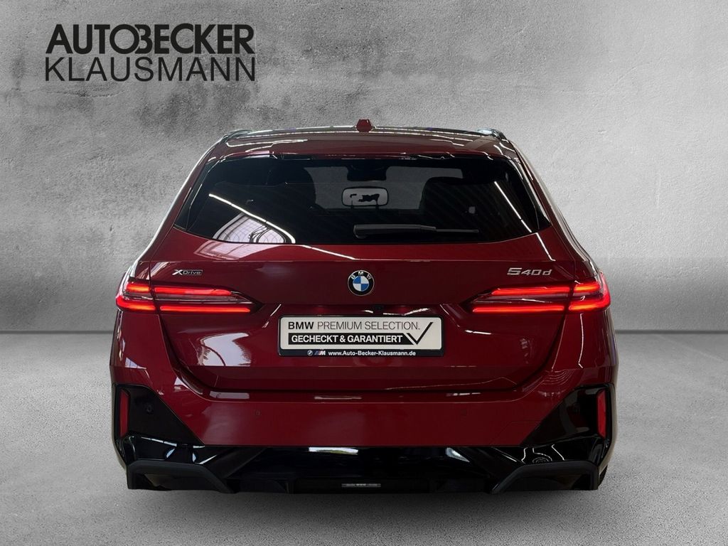 BMW 540 2025 г. Красный, пробег 34587 км