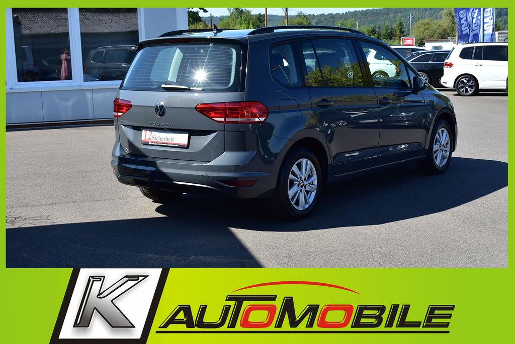 Volkswagen Touran 2023 г. Серый, пробег 46897 км