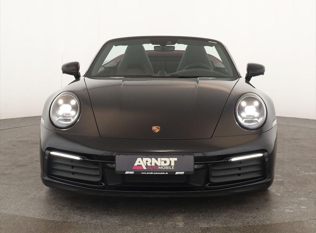 Porsche 992 2023 г. Чёрный, пробег 53300 км