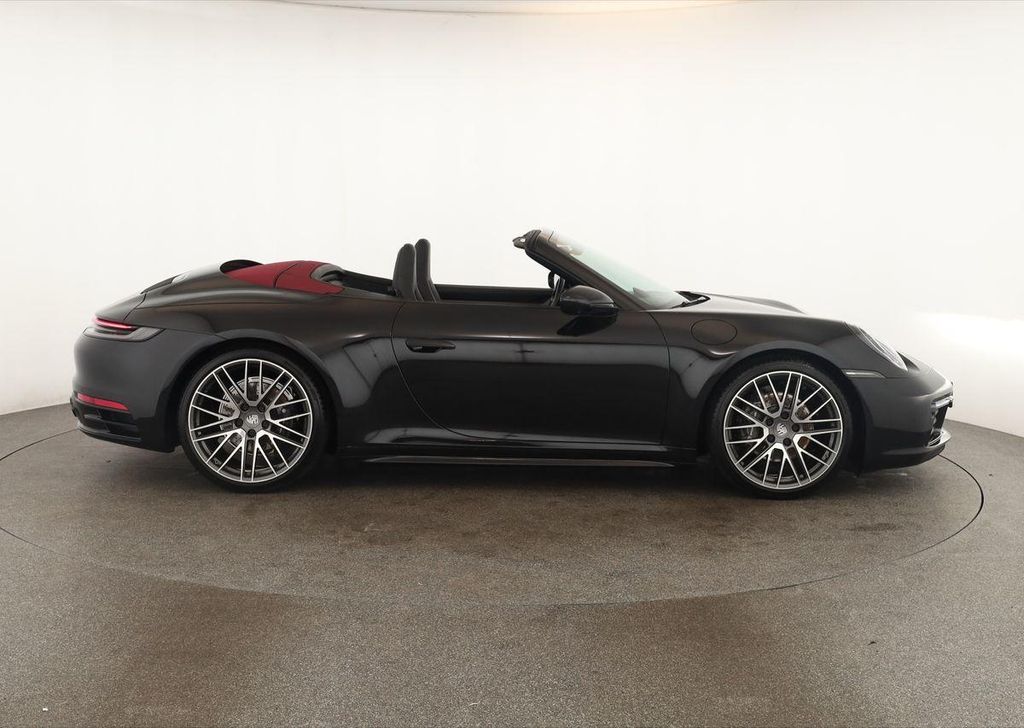 Porsche 992 2023 г. Чёрный, пробег 53300 км