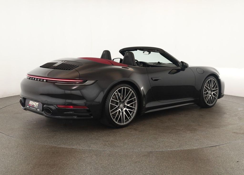 Porsche 992 2023 г. Чёрный, пробег 53300 км