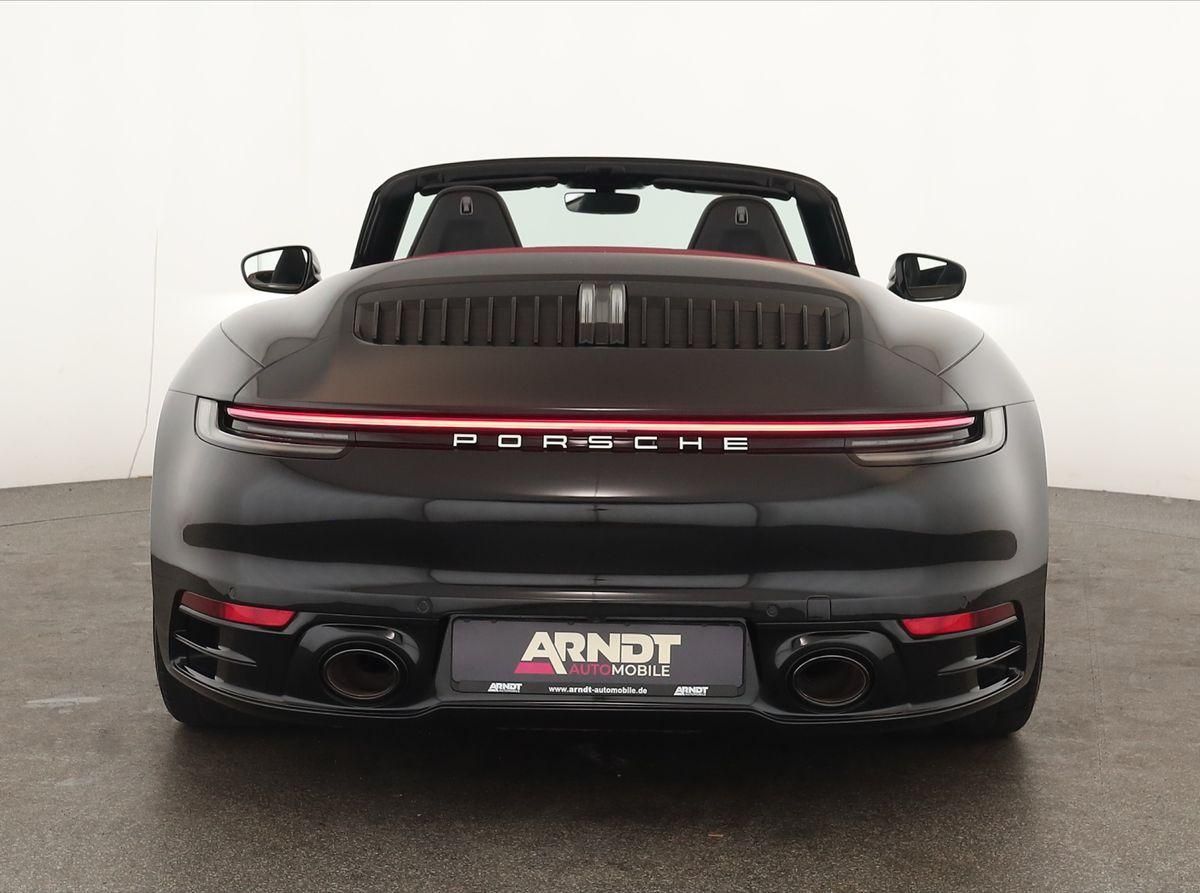 Porsche 992 2023 г. Чёрный, пробег 53300 км