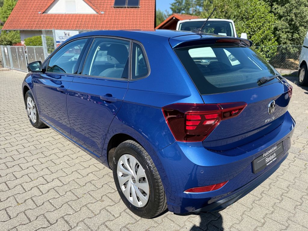 Volkswagen Polo 2023 г. Синий, пробег 59500 км