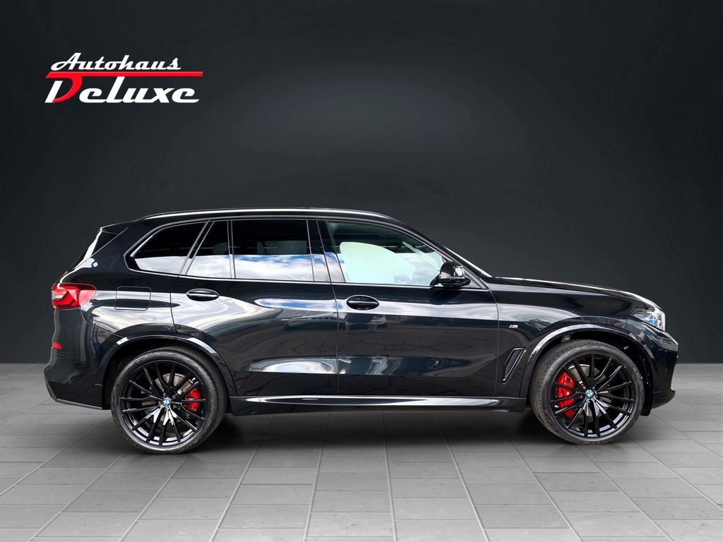 BMW X5 2023 г. Чёрный, пробег 50000 км
