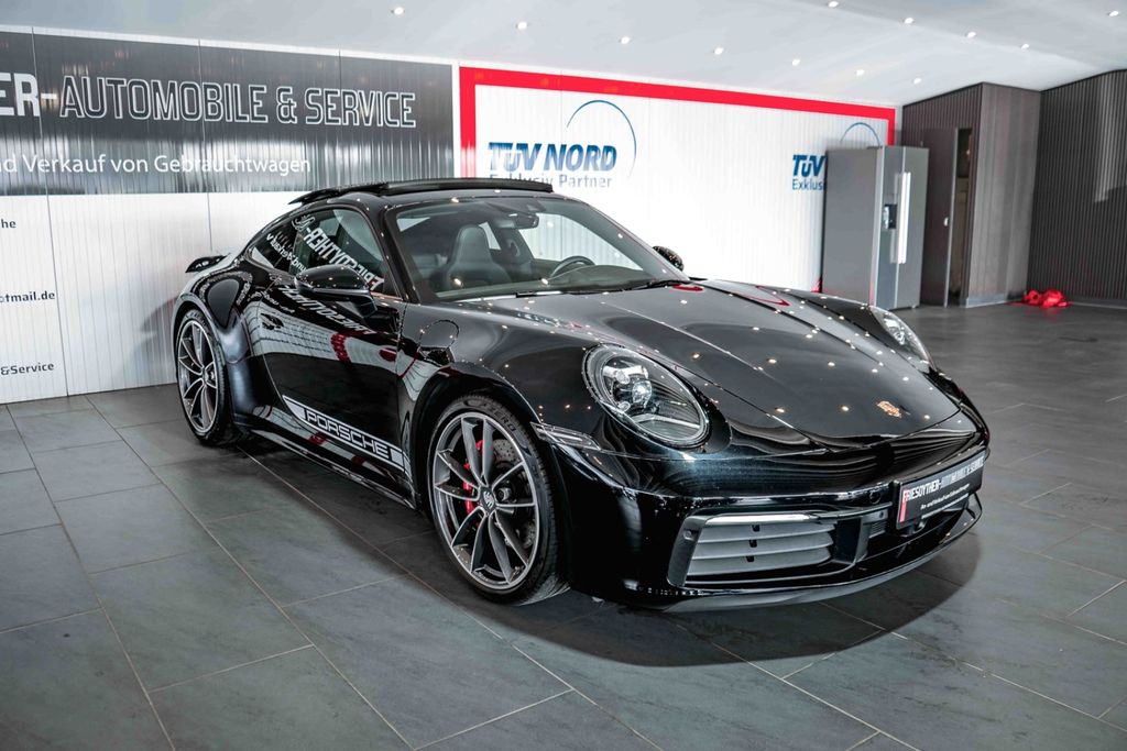 Porsche 992 2021 г. Чёрный, пробег 32450 км