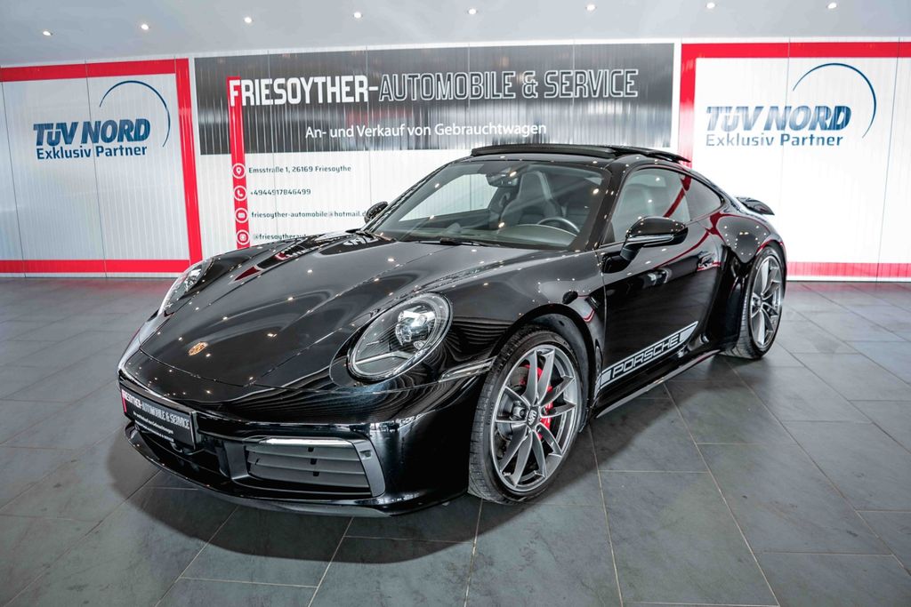 Porsche 992 2021 г. Чёрный, пробег 32450 км