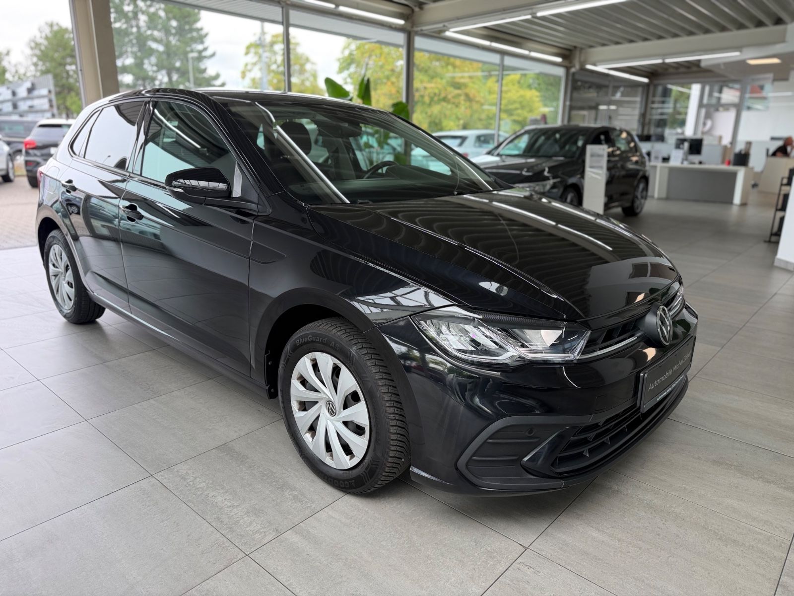 Volkswagen Polo 2023 г. Чёрный, пробег 50000 км