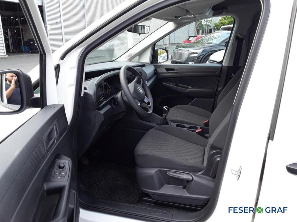 Volkswagen Caddy 2023 г. Белый, пробег 28750 км