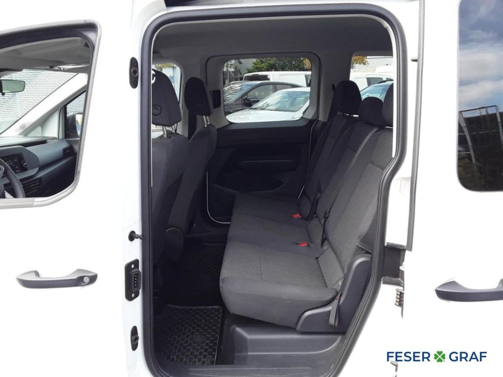 Volkswagen Caddy 2023 г. Белый, пробег 28750 км