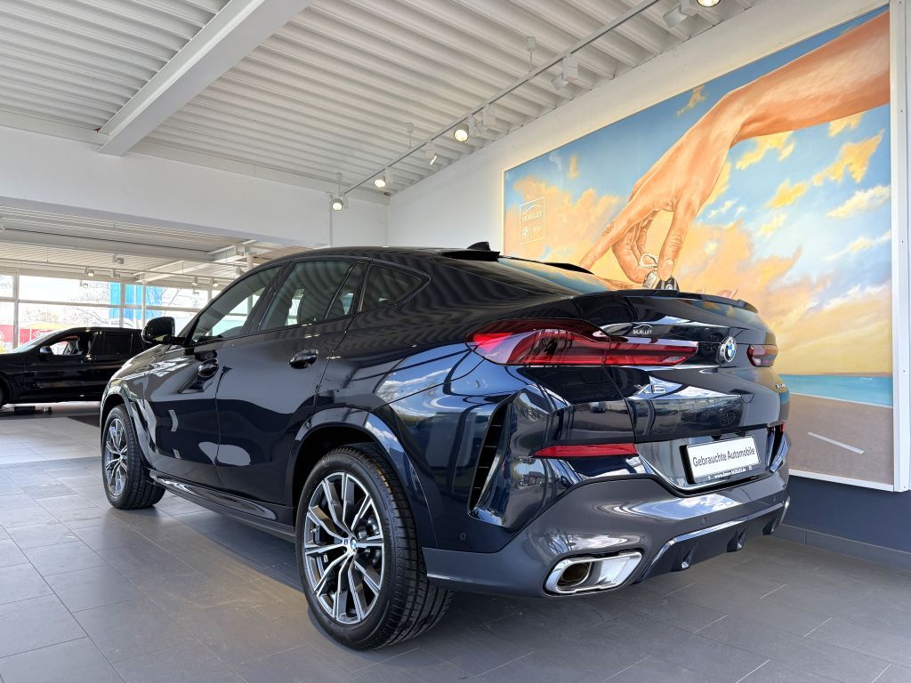 BMW X6 2023 г. Чёрный, пробег 45000 км
