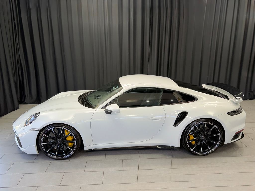Porsche 992 2021 г. Белый, пробег 25000 км