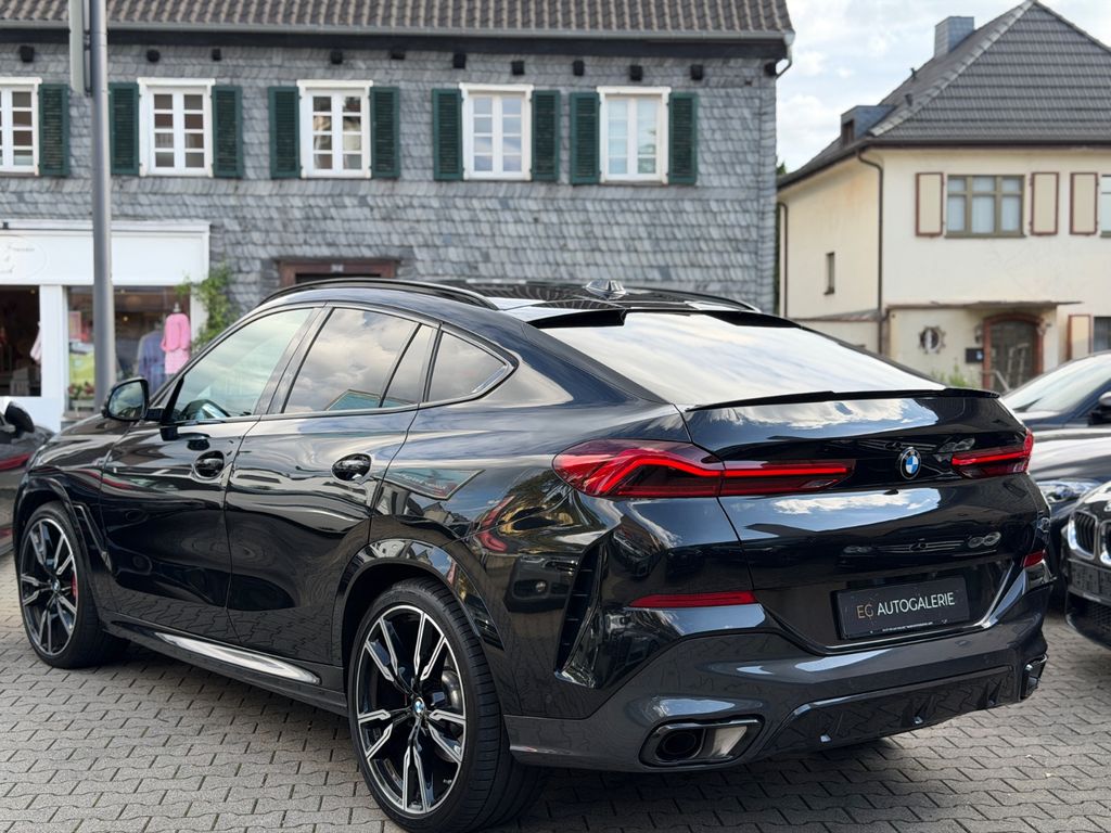 BMW X6 2024 г. Чёрный, пробег 54800 км