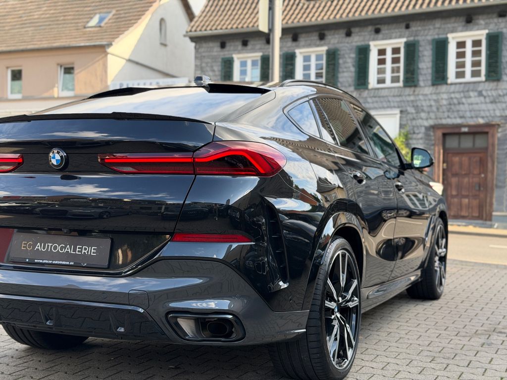 BMW X6 2024 г. Чёрный, пробег 54800 км