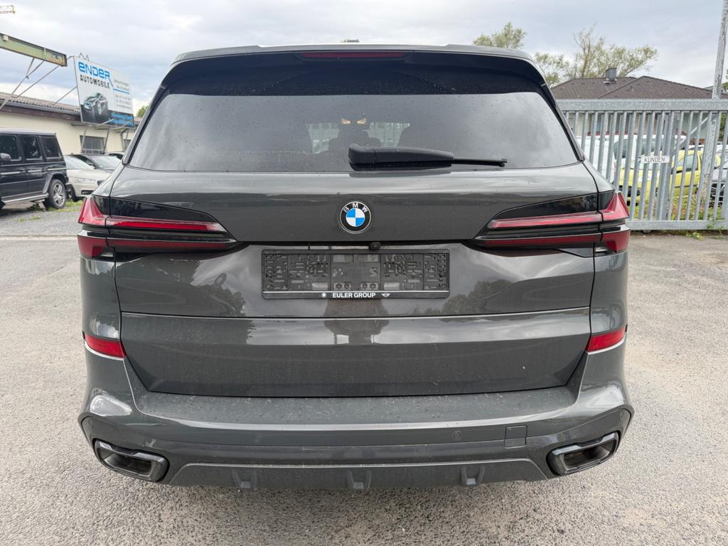 BMW X5 2023 г. Серый, пробег 38500 км