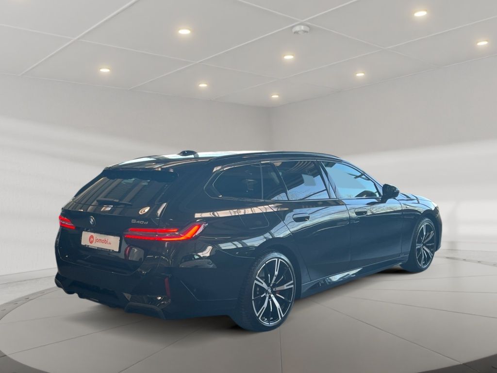 BMW 540 2025 г. Чёрный, пробег 13460 км