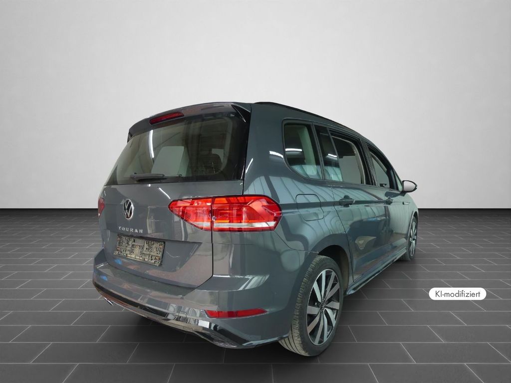 Volkswagen Touran 2023 г. Серый, пробег 54397 км
