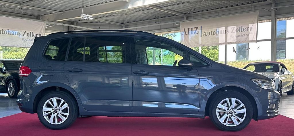 Volkswagen Touran 2024 г. Серый, пробег 59200 км