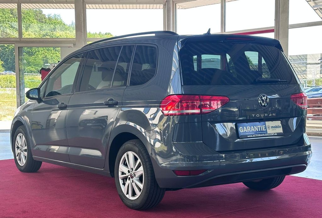 Volkswagen Touran 2024 г. Серый, пробег 59200 км