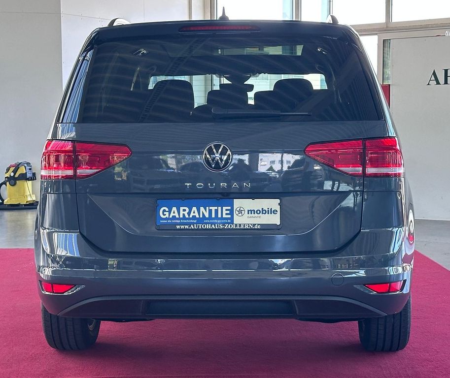 Volkswagen Touran 2024 г. Серый, пробег 59200 км