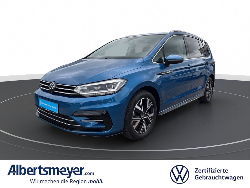 Volkswagen Touran 2023 г. Синий, пробег 57408 км