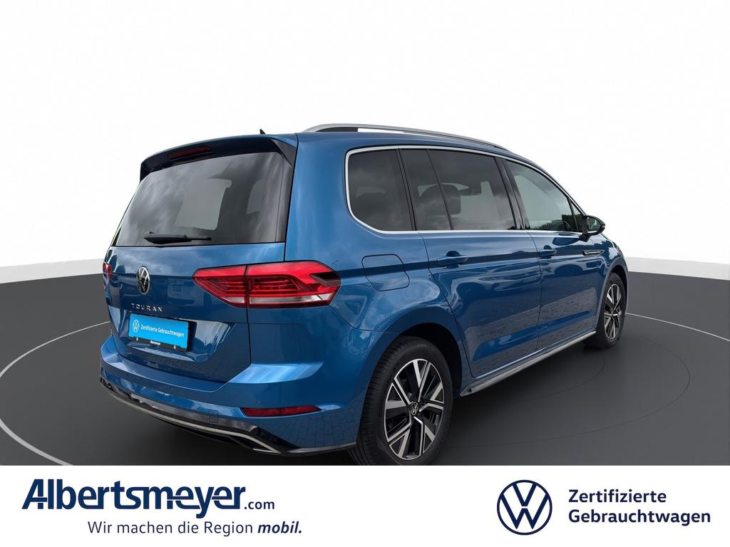 Volkswagen Touran 2023 г. Синий, пробег 57408 км