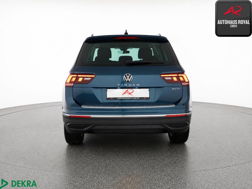 Volkswagen Tiguan 2023 г. Синий, пробег 40000 км