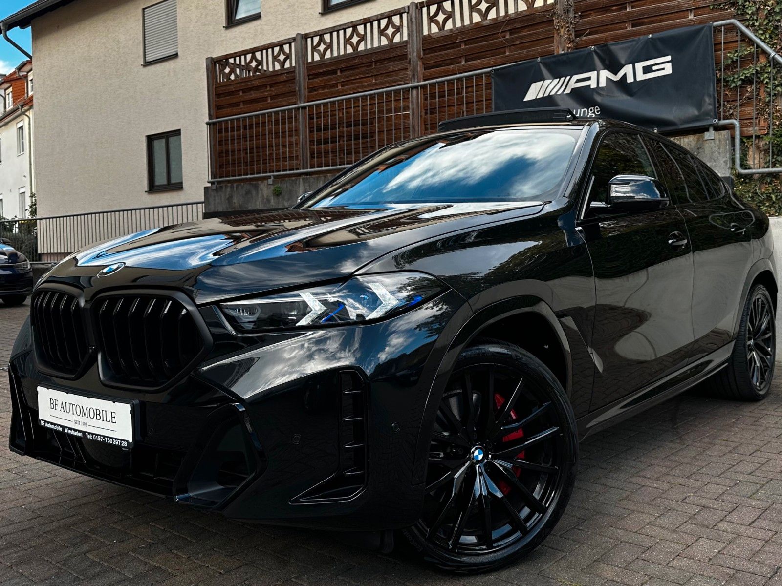 BMW X6 2023 г. Чёрный, пробег 54000 км