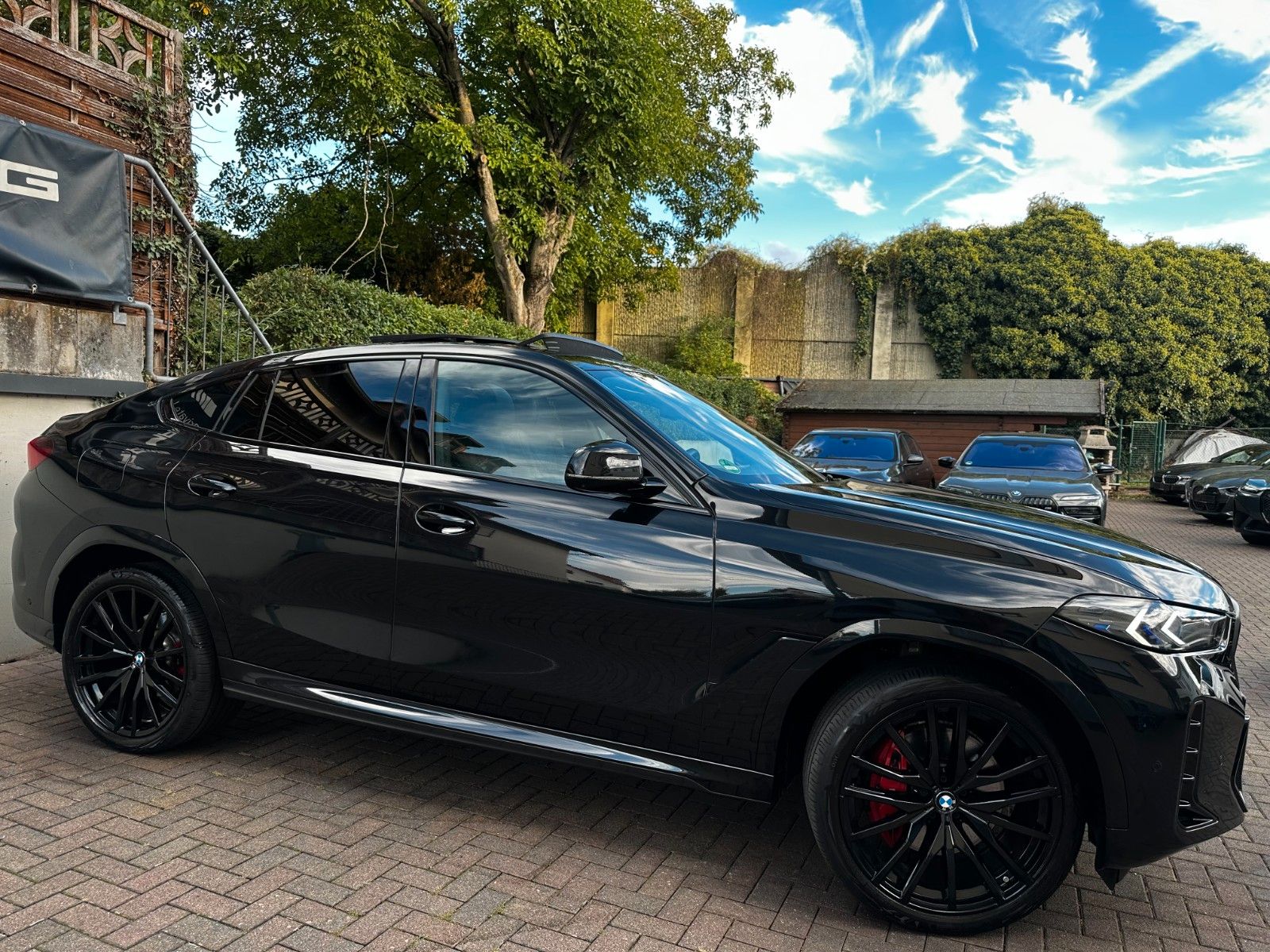 BMW X6 2023 г. Чёрный, пробег 54000 км