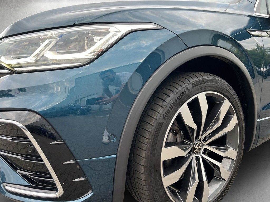 Volkswagen Tiguan 2023 г. Синий, пробег 23685 км
