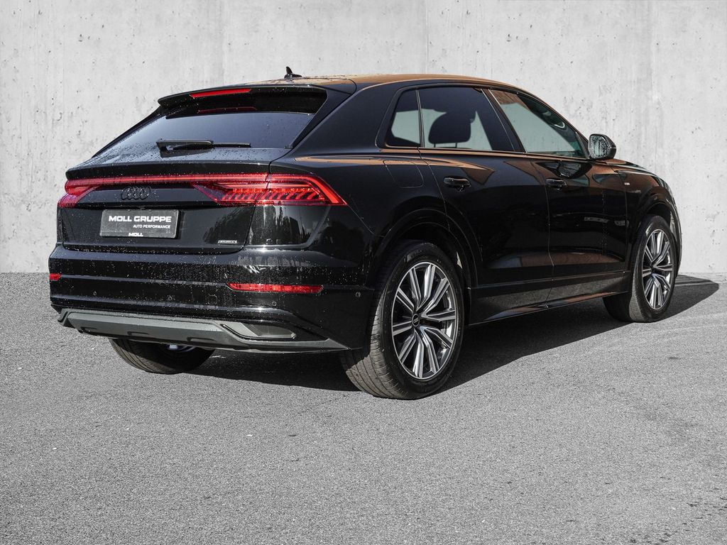 Audi Q8 2023 г. Чёрный, пробег 28734 км