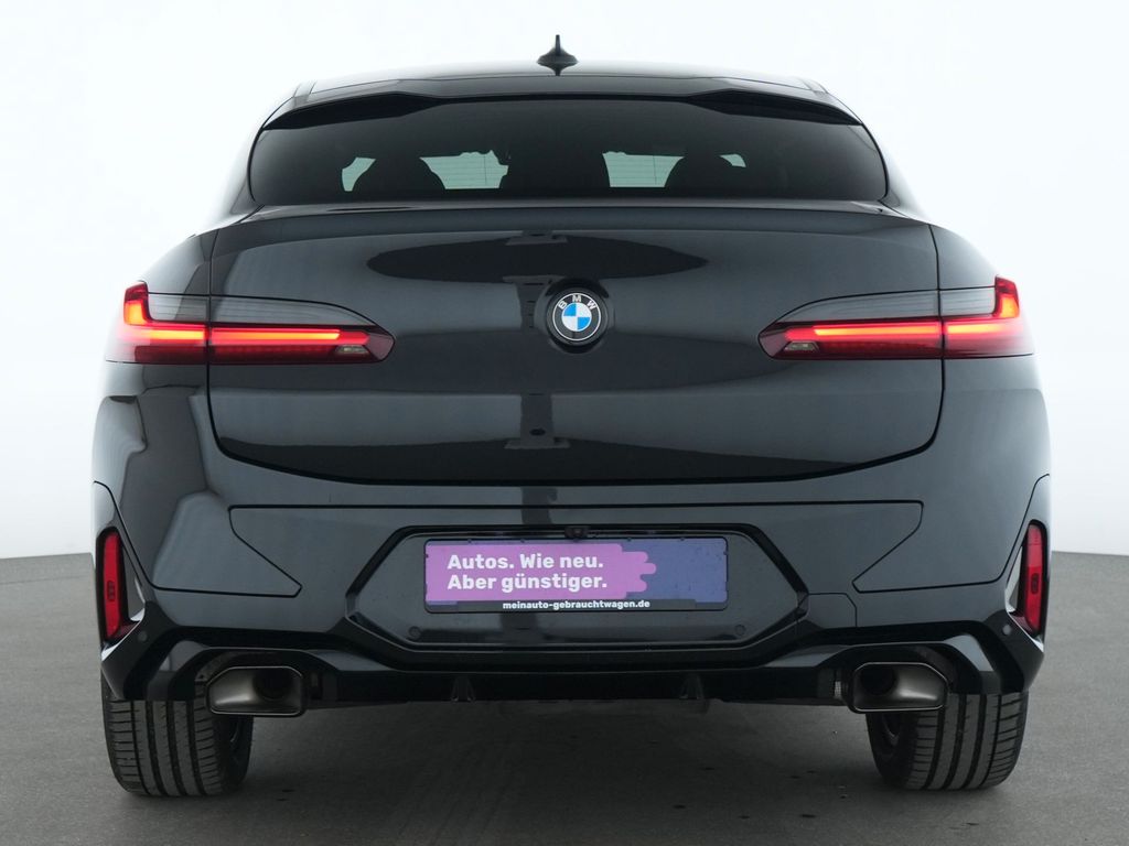 BMW X4 M 2023 г. Чёрный, пробег 32413 км
