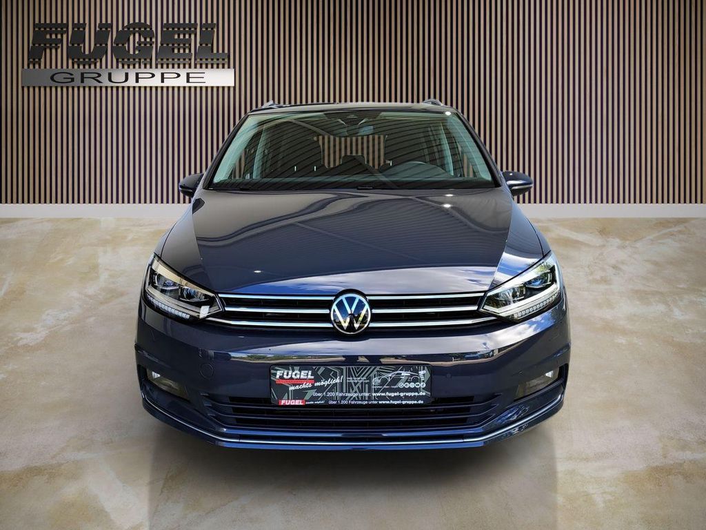 Volkswagen Touran 2022 г. Серый, пробег 59610 км
