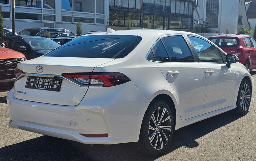 Toyota Corolla 2023 г. Белый, пробег 59479 км