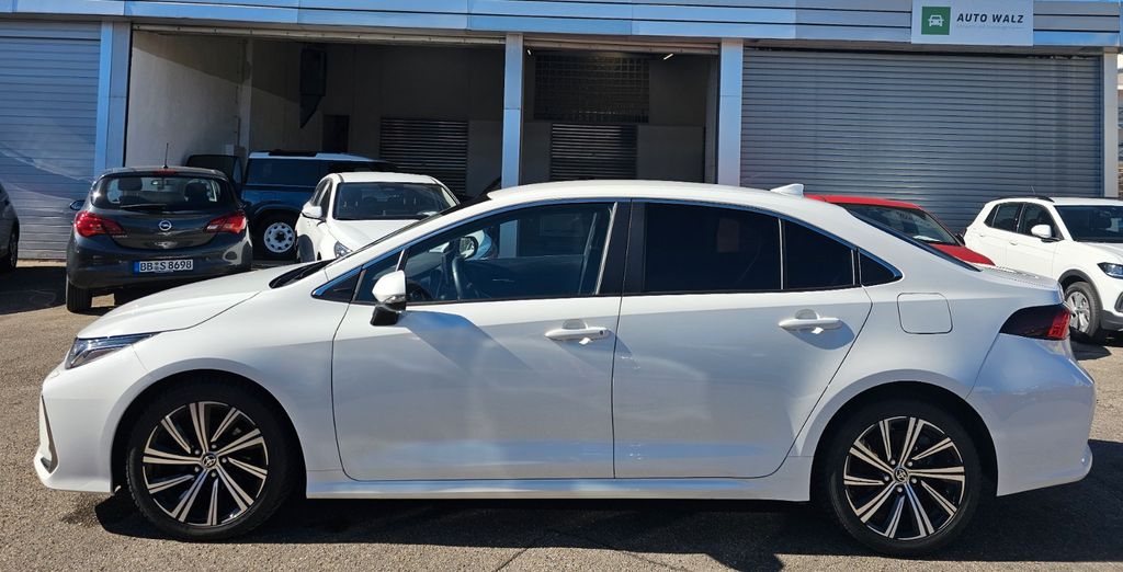 Toyota Corolla 2023 г. Белый, пробег 59479 км